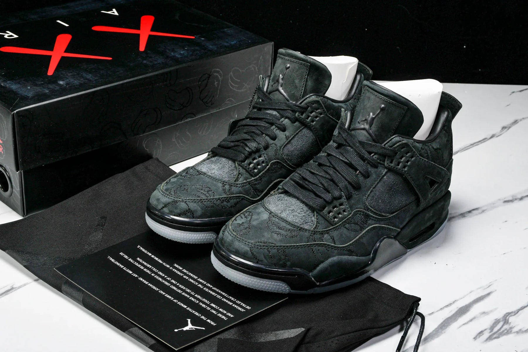 Air Jordan 4 Retro x Kaws Black